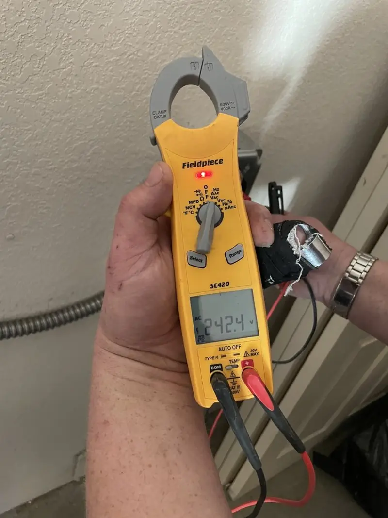 Voltage testing with clamp meter during Ceiling Fan Installation in Mount Prospect